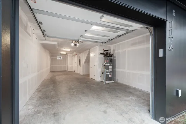 a view of empty room with fireplace