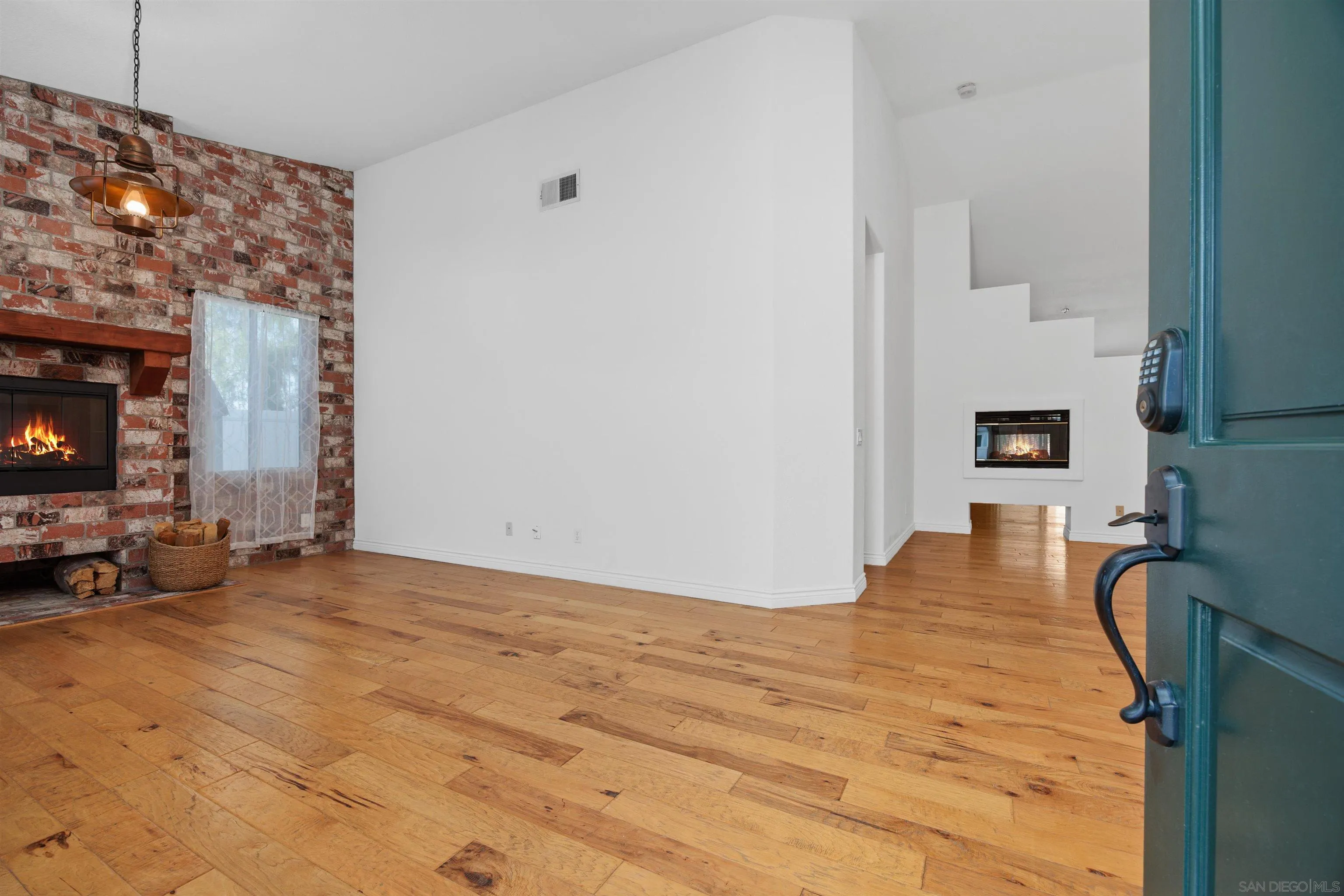 3643 Merced Drive Oceanside, CA 92056 - Photo 3 of 27 a view of a livingroom with furniture and an empty room