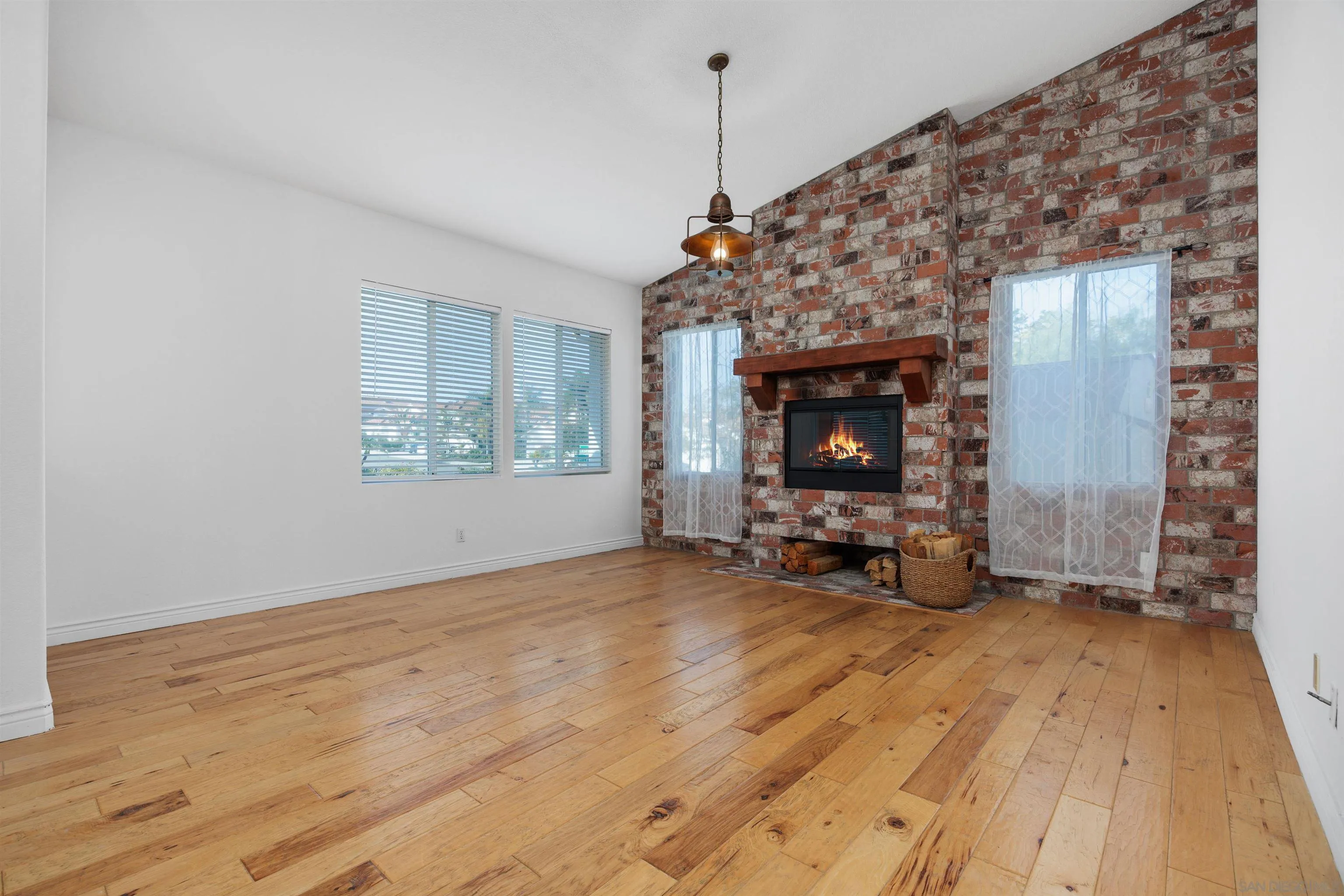 3643 Merced Drive Oceanside, CA 92056 - Photo 4 of 27 a view of a livingroom with fireplace and window