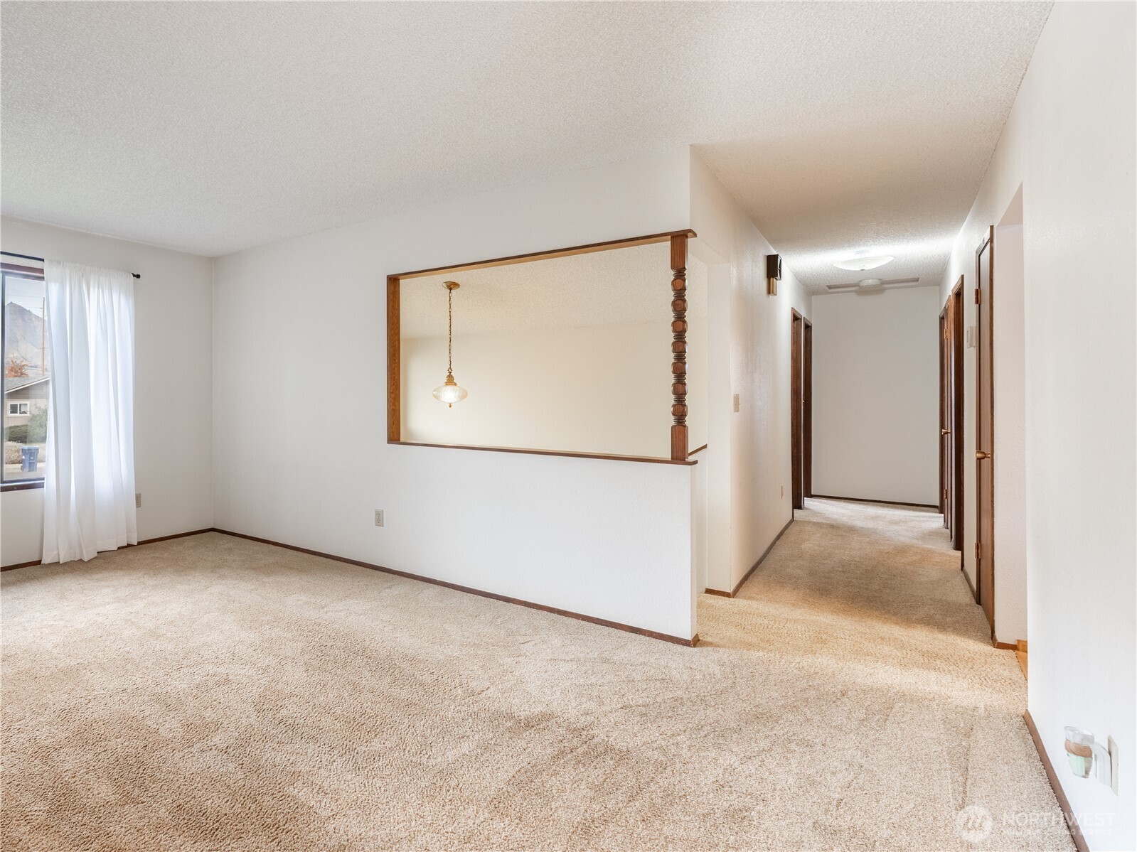 1317 Wedgewood Avenue Wenatchee, WA 98801 - Photo 11 of 39 an empty room with windows