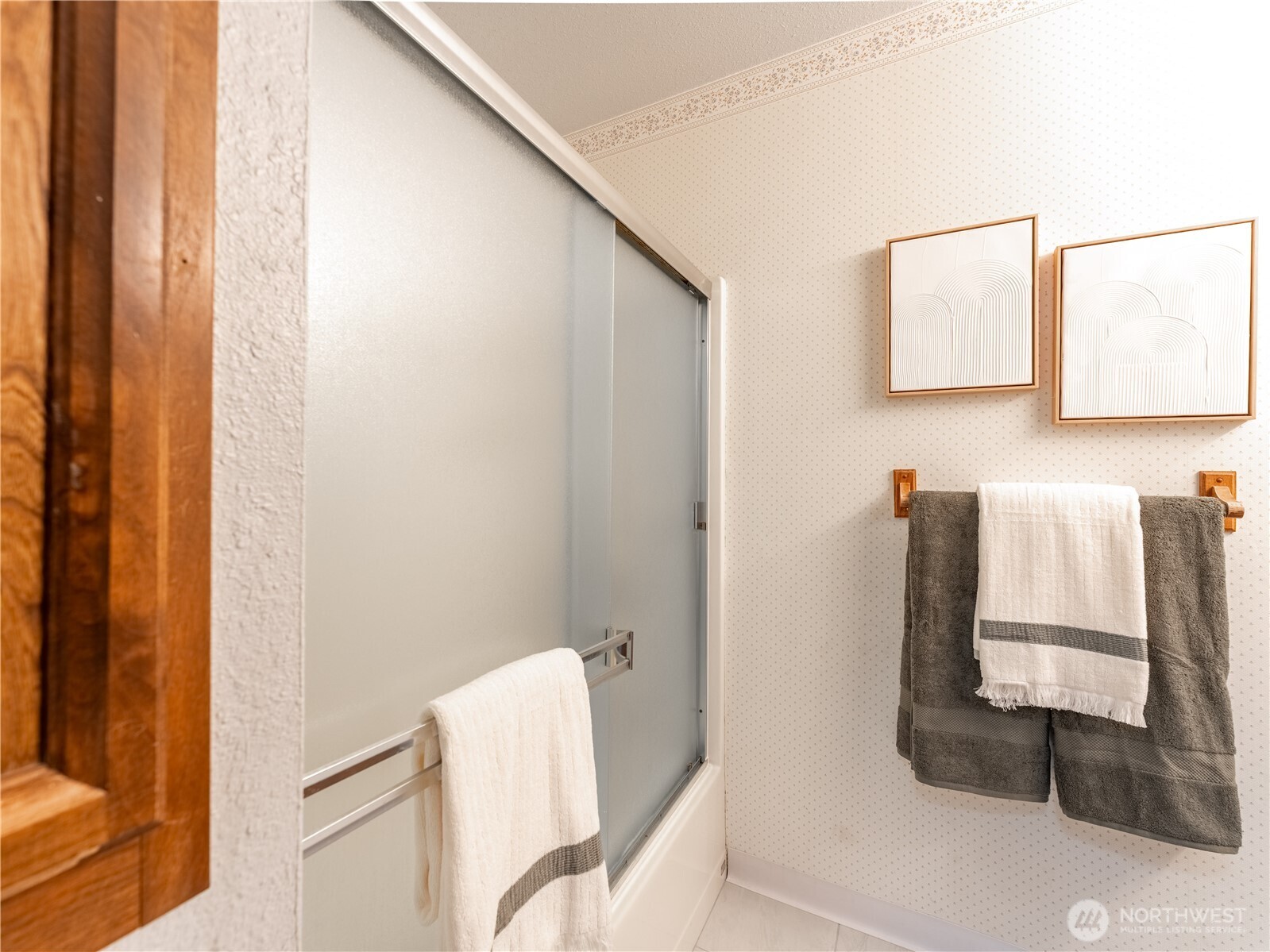 1317 Wedgewood Avenue Wenatchee, WA 98801 - Photo 17 of 39 a bathroom with a bathtub and a shower