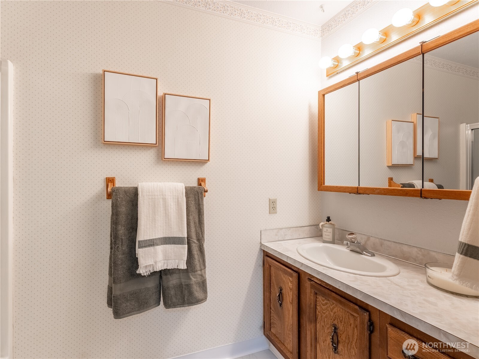 1317 Wedgewood Avenue Wenatchee, WA 98801 - Photo 18 of 39 a bathroom with a sink and a mirror