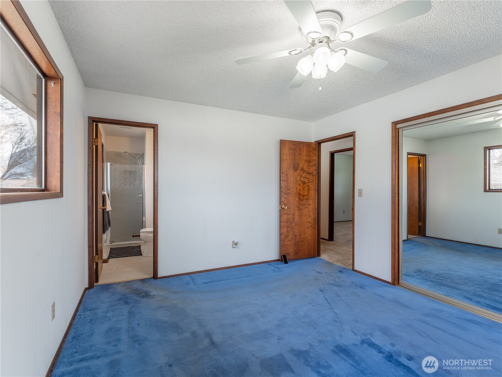 1317 Wedgewood Avenue Wenatchee, WA 98801 - Photo 22 of 39 wooden floor and windows in a room