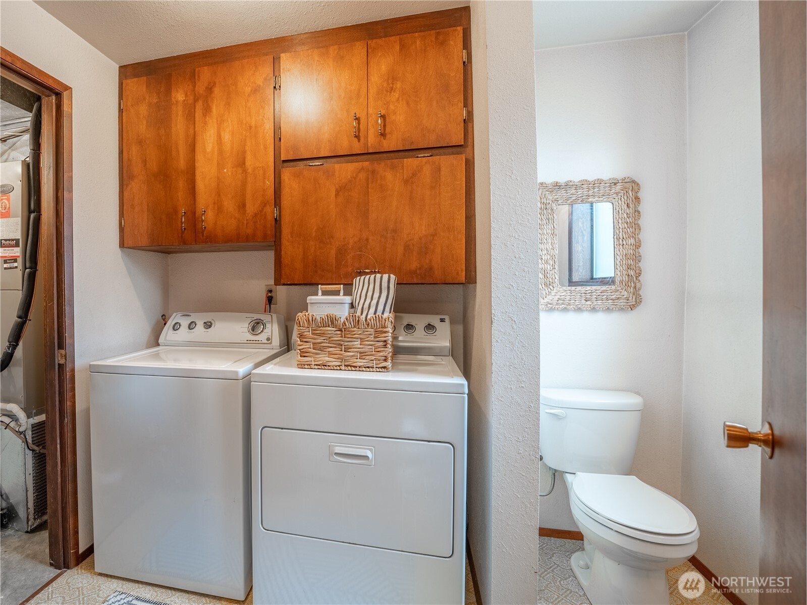 1317 Wedgewood Avenue Wenatchee, WA 98801 - Photo 28 of 39 a bathroom with a sink a toilet and shower curtain