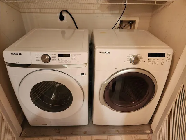 a utility room with dryer and washer