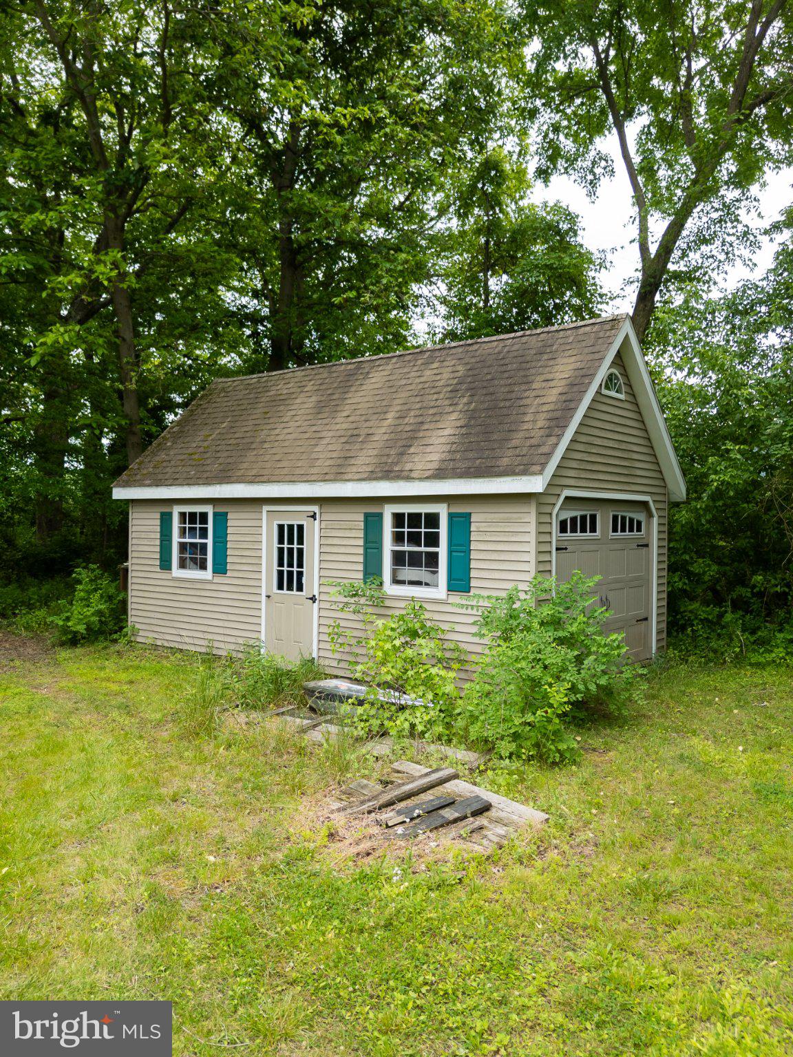 911 Monmouth Road New Egypt, NJ 08533 - Photo 15 of 19 Charming cottage nestled in nature.