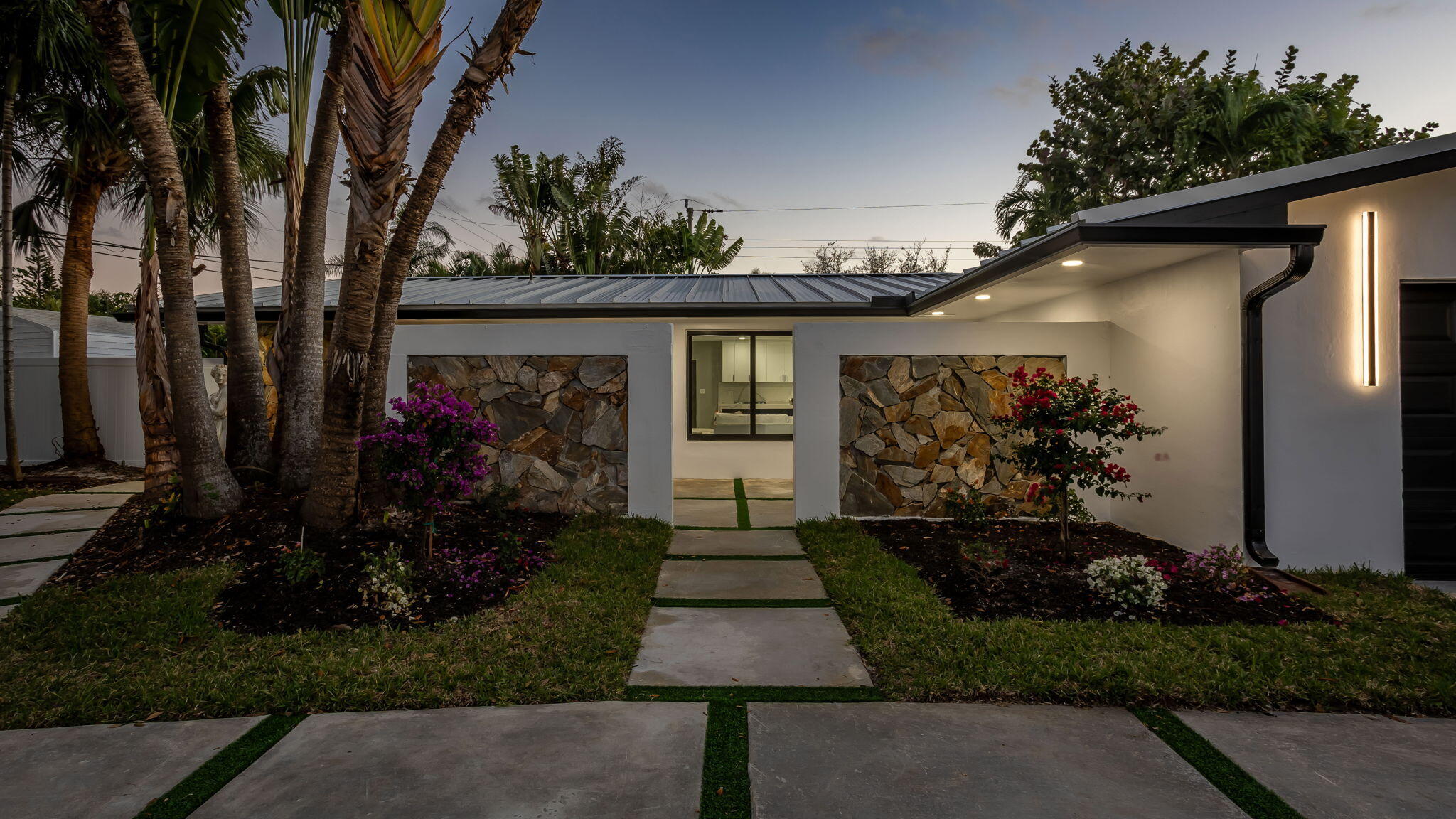 200 Southwest 12th Street Boca Raton, FL 33432 - Photo 54 of 70 a front view of a house with garden