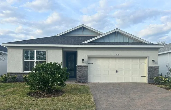 front view of house with a yard