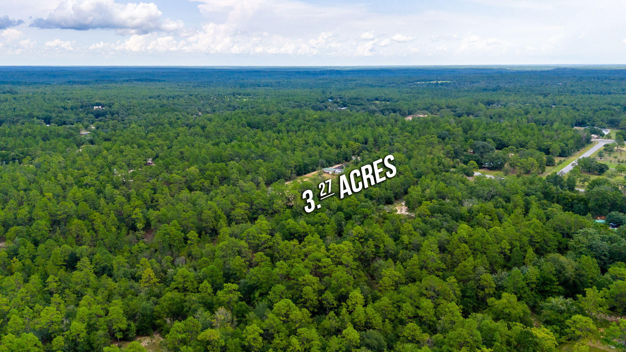 0 Bear Creek Road Crestview, FL 32539 - Photo 18 of 20 a view of a green field with lots of bushes