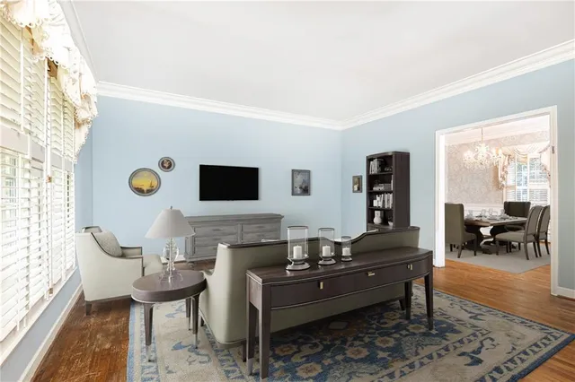 a living room with furniture and a table