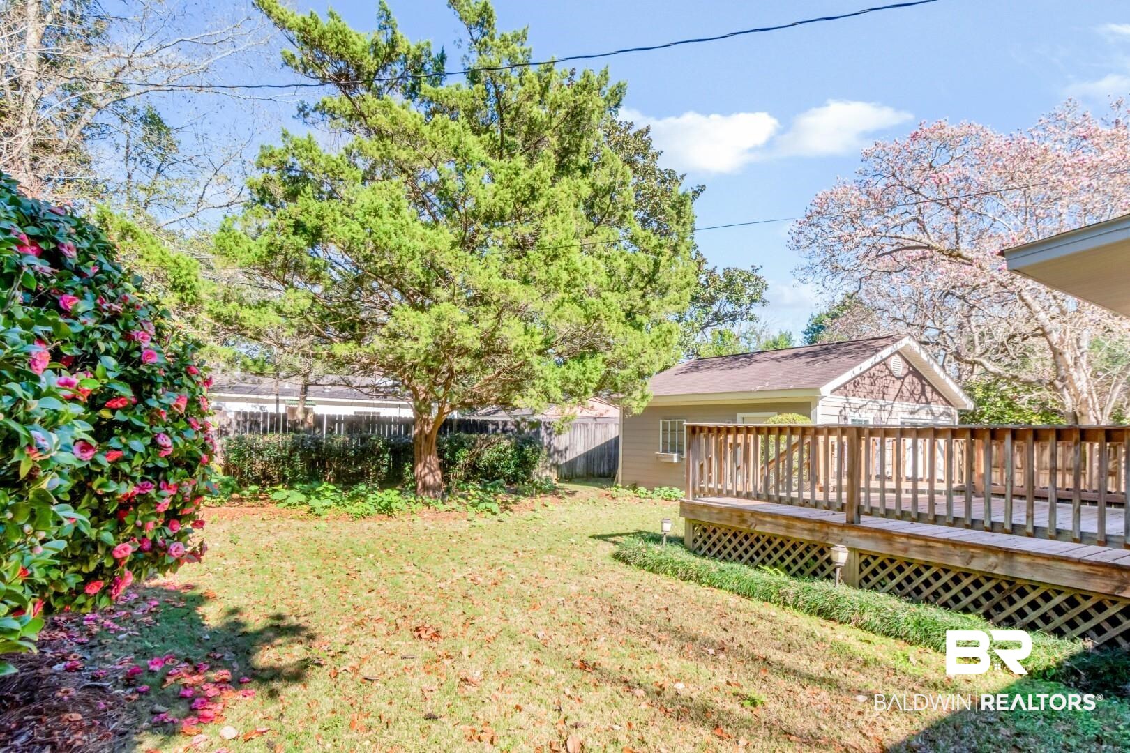 10 South Hathaway Road Mobile, AL 36608 - Photo 35 of 46 Fenced backyard with a wooden deck