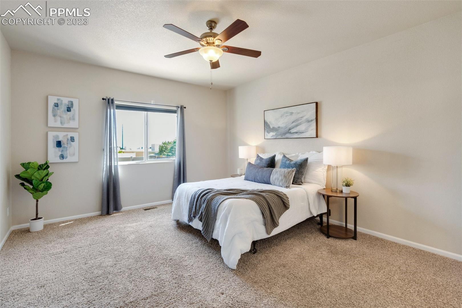 7040 Red Cardinal Loop Colorado Springs, CO 80908 - Photo 9 of 28 Primary Bedroom