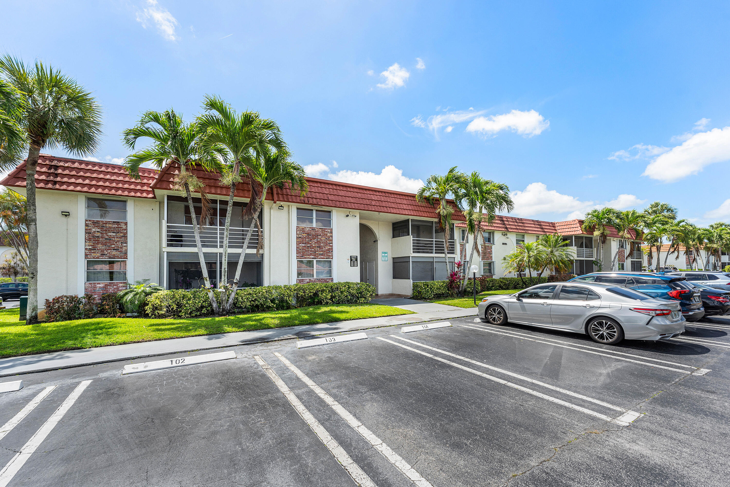 22725 Southwest 66th Avenue, Unit 103 Boca Raton, FL 33428 - Photo 1 of 14 Exterior – Front View with Parking