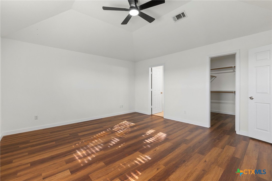 1751 Joy Spring New Braunfels, TX 78130 - Photo 17 of 35 wooden floor in an empty room