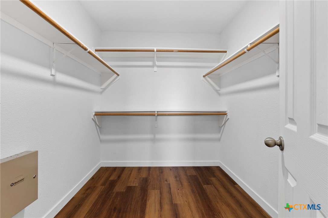 1751 Joy Spring New Braunfels, TX 78130 - Photo 20 of 35 a view of a room with wooden floor