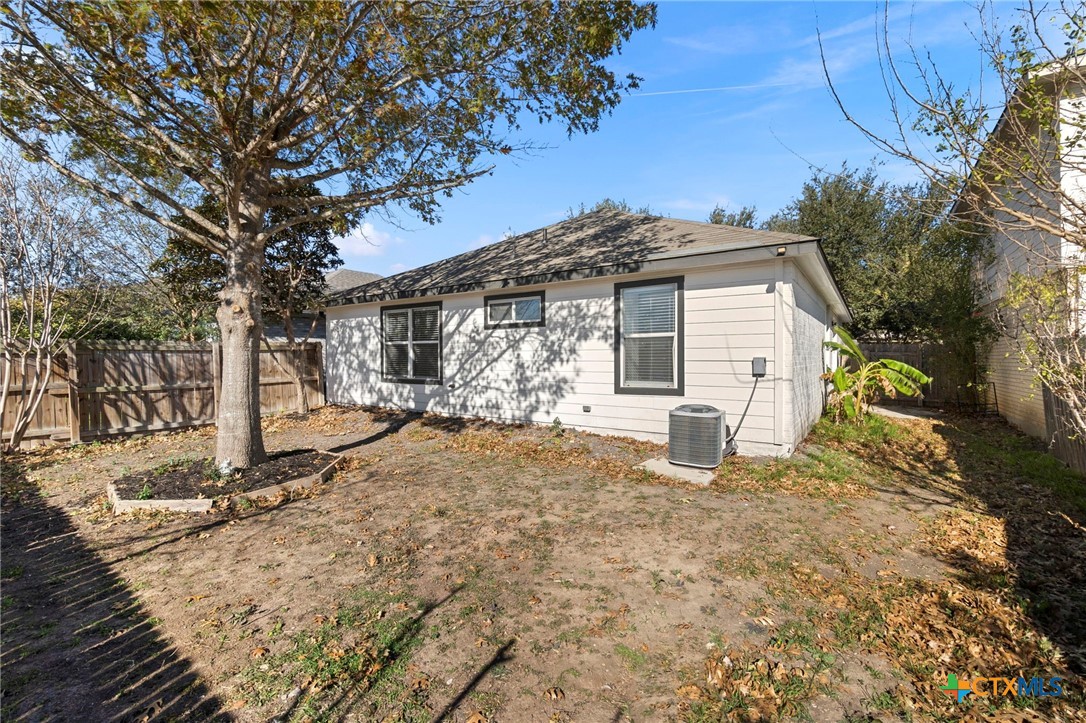1751 Joy Spring New Braunfels, TX 78130 - Photo 30 of 35 a view of a house with a yard covered in snow