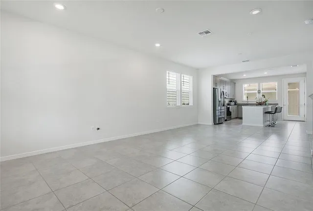 a view of a livingroom with a staircase