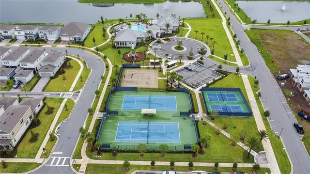 a view of outdoor space with playground and green space