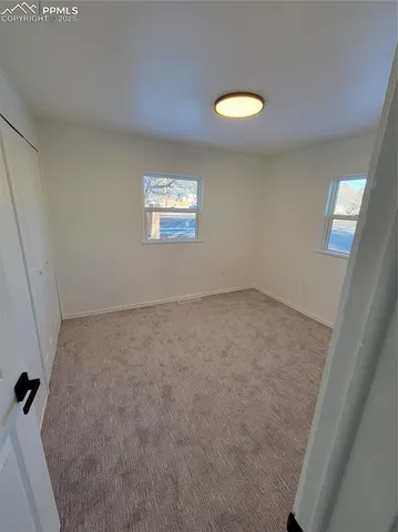 an empty room with a window