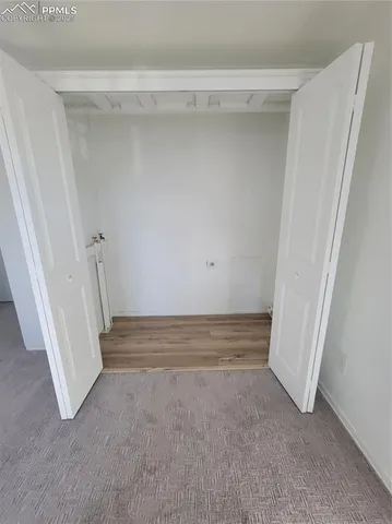 a view of room with stairs and a window