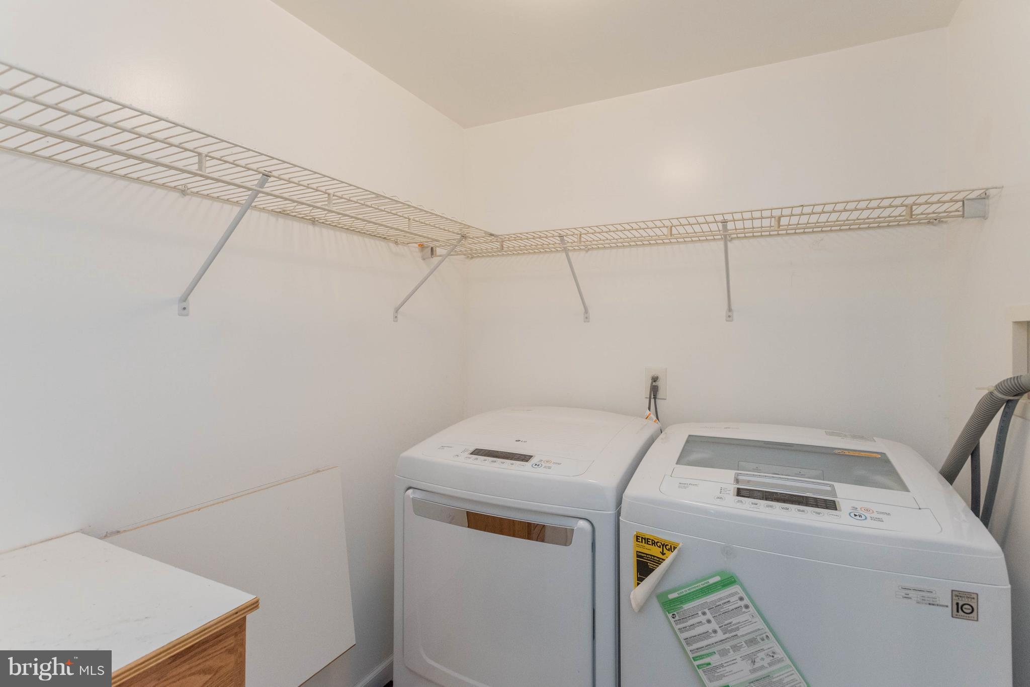 1404 Providence Road Baltimore, MD 21286 - Photo 23 of 26 a utility room with dryer and washer