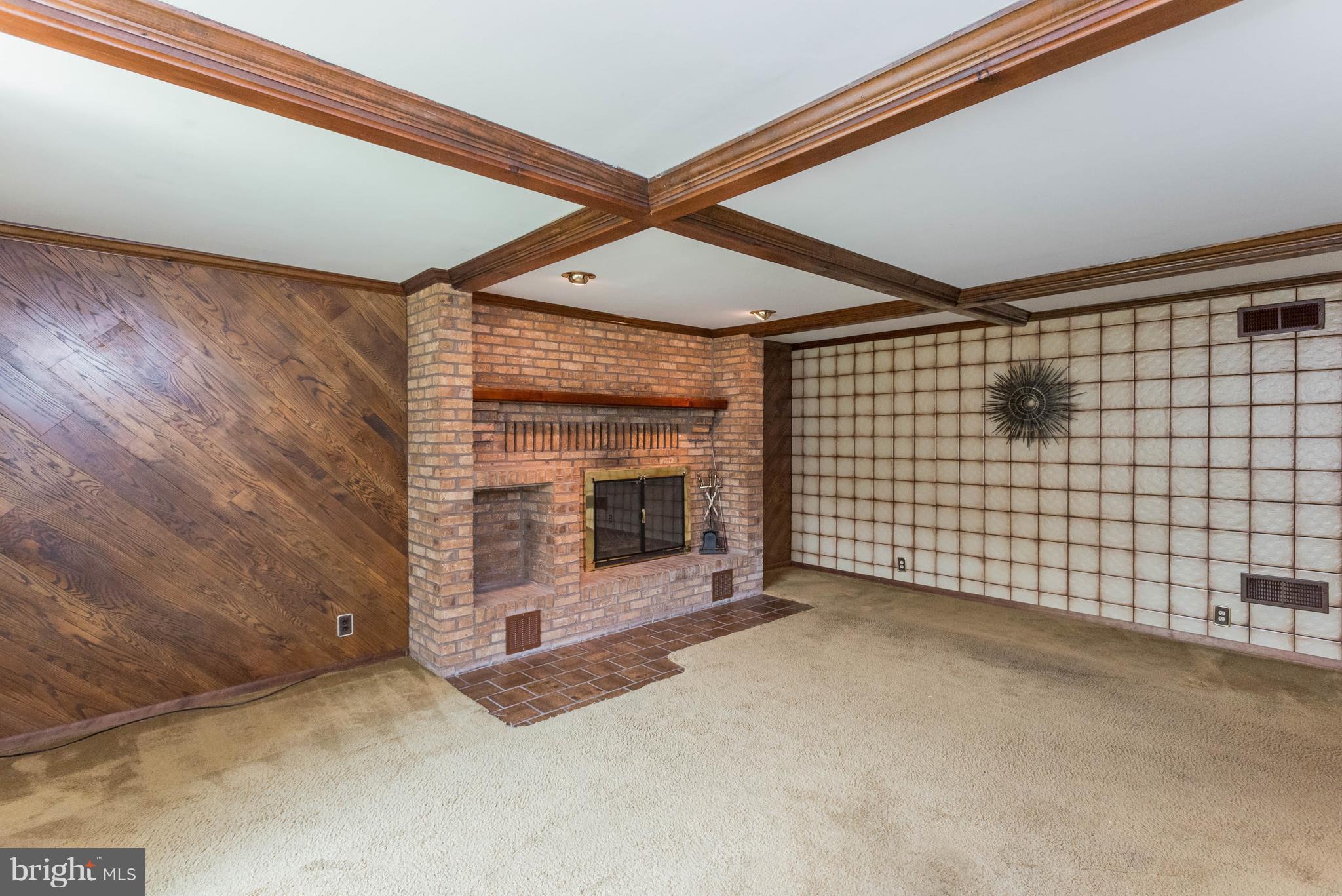 1404 Providence Road Baltimore, MD 21286 - Photo 4 of 26 a view of an empty room with a fireplace