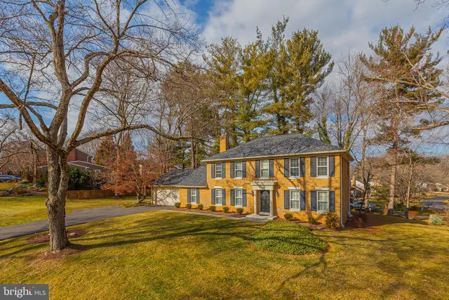 a view of swimming pool with outdoor seating and yard