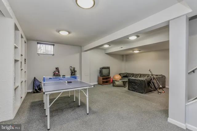 a view of a workspace with furniture