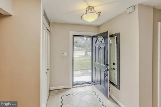 a view of a hallway with a outdoor space