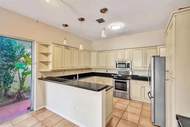 $844,000 | 15651 Northwest 14th Court, Pembroke Pines, FL 33028