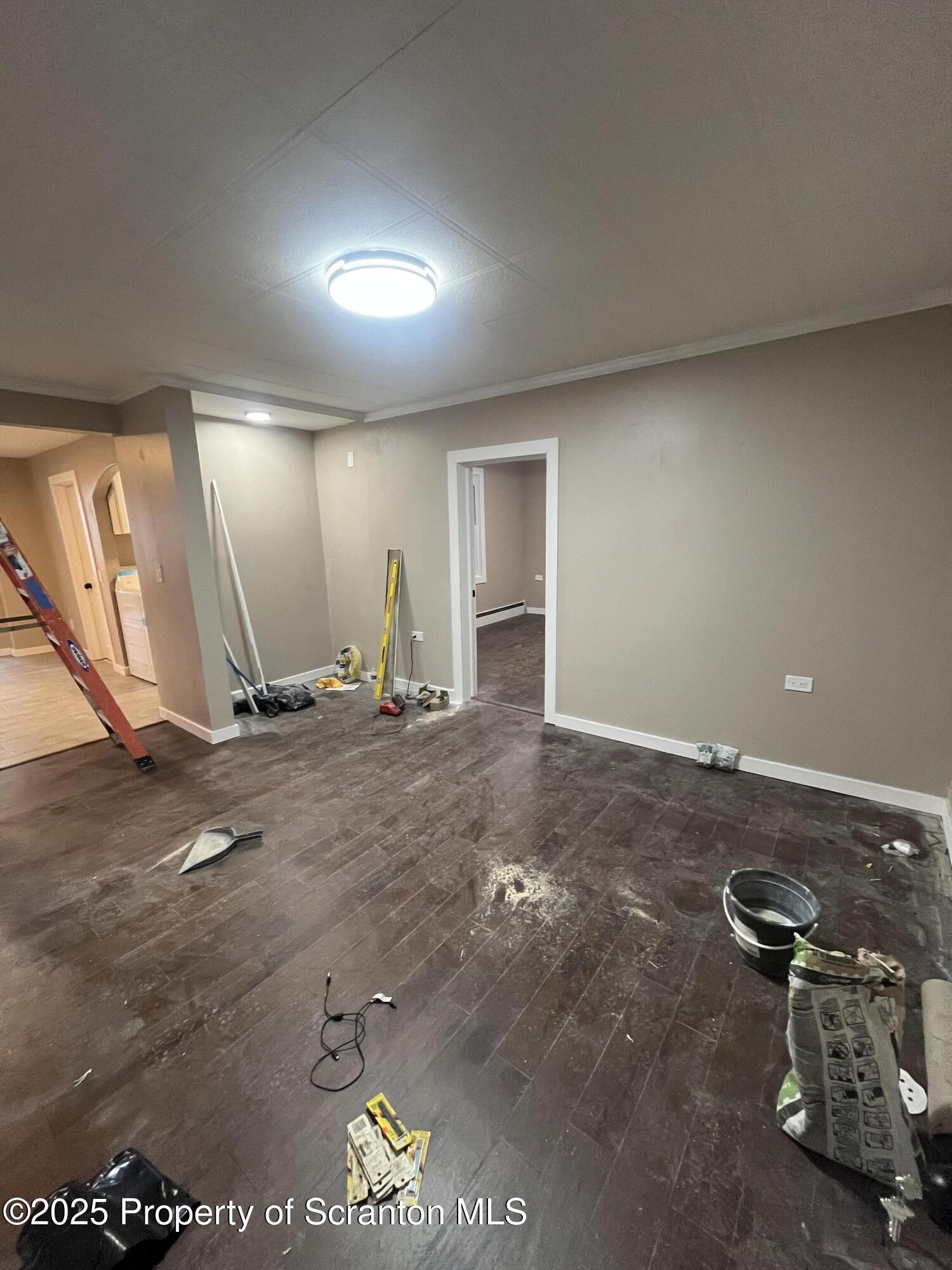 129 South Blakely Street, Unit 1 Dunmore, PA 18512 - Photo 3 of 6 a view of a room with gym equipment