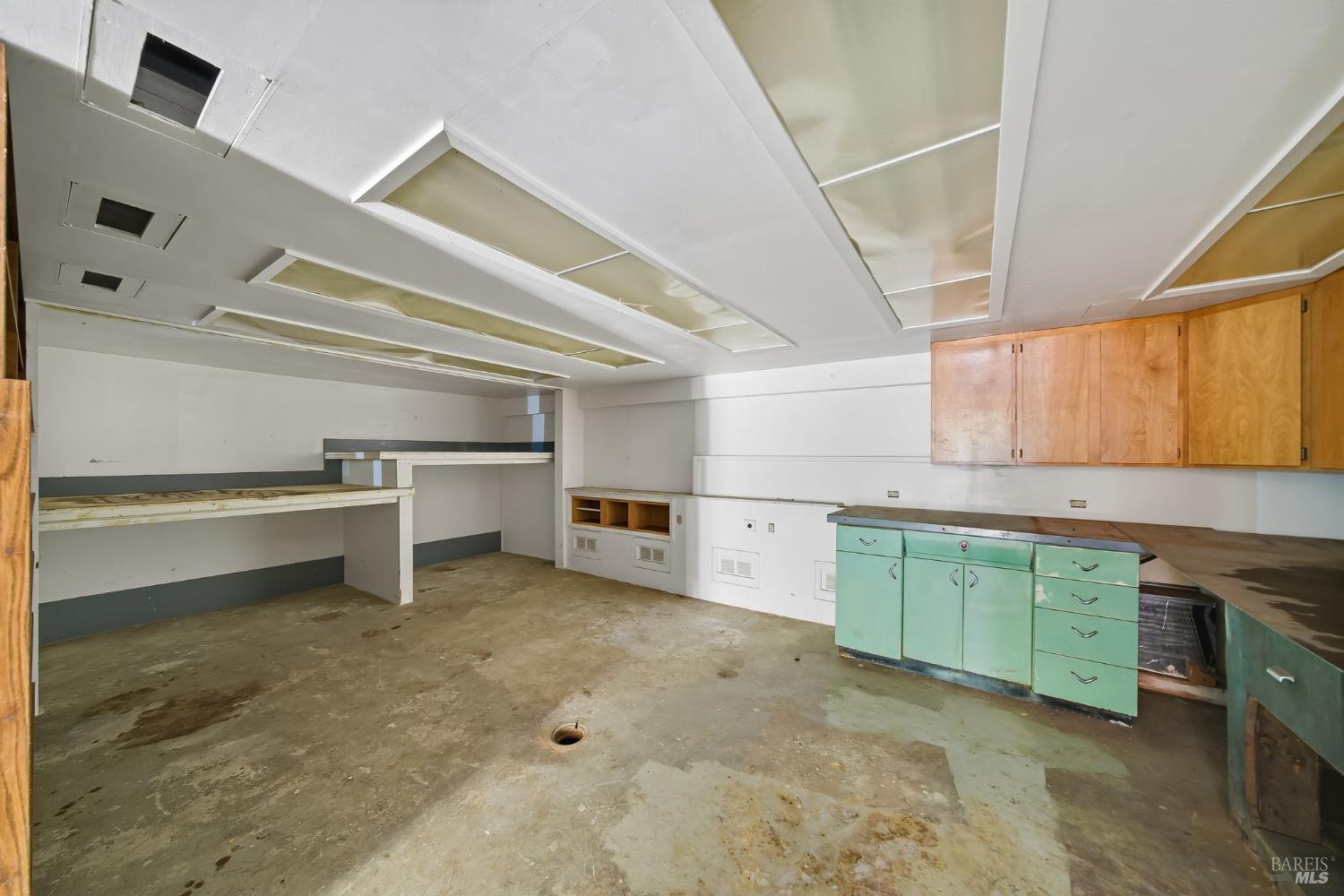 226 Bayview Street San Rafael, CA 94901 - Photo 14 of 56 a kitchen with cabinets and window