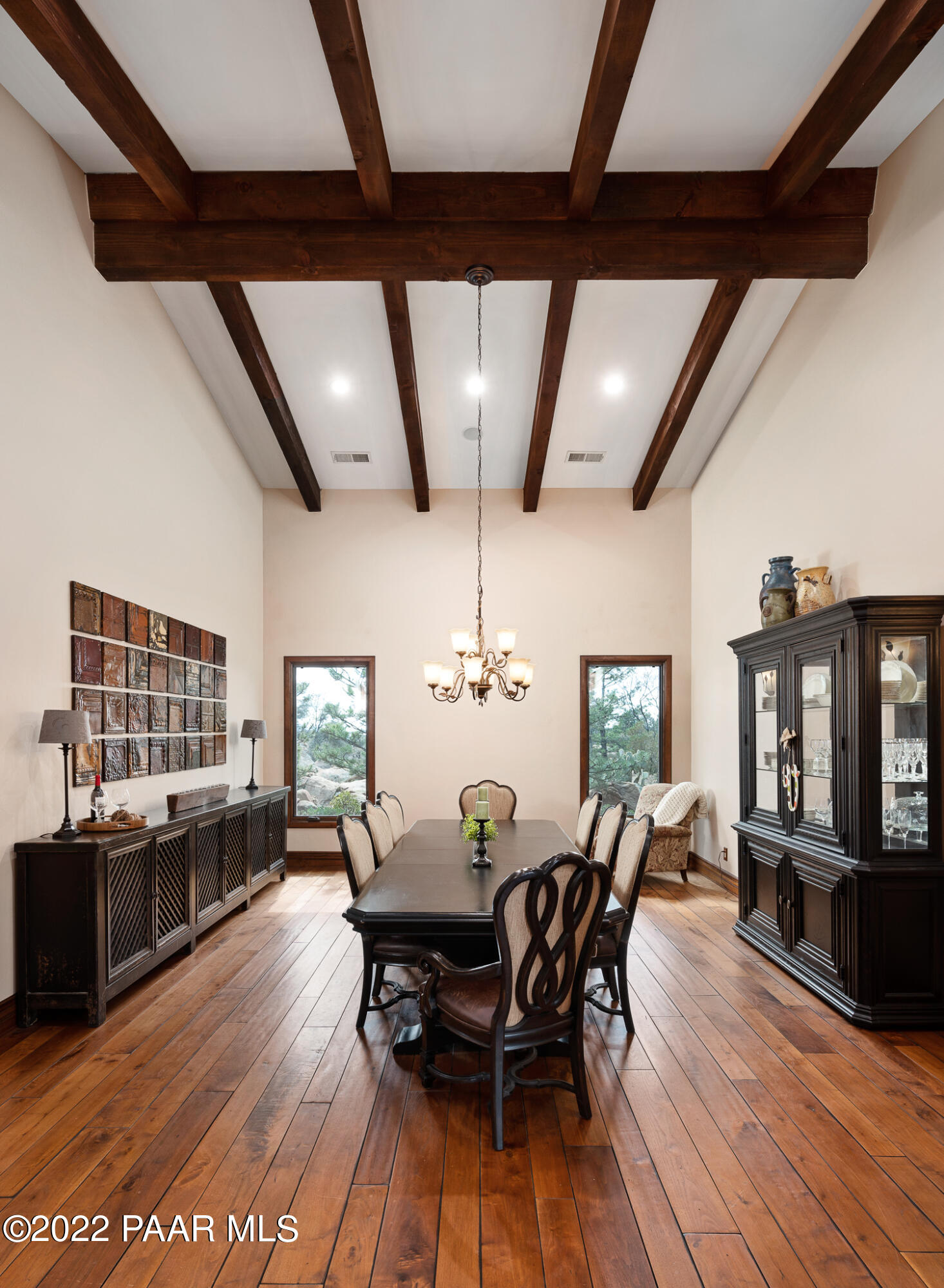5350 West Three Forks Road Prescott, AZ 86305 - Photo 27 of 90 a view of a dining room with furniture and wooden floor