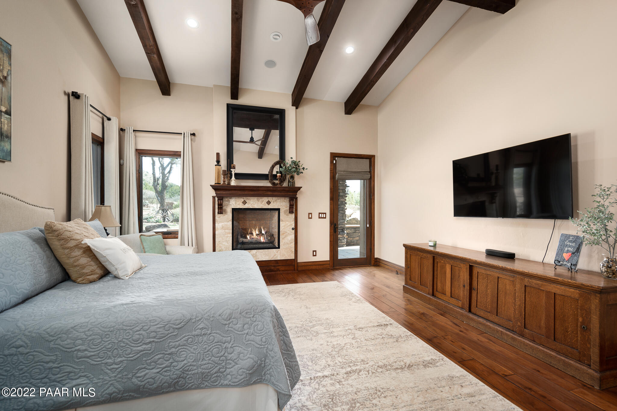 5350 West Three Forks Road Prescott, AZ 86305 - Photo 33 of 90 a bedroom with a bed and a flat screen tv