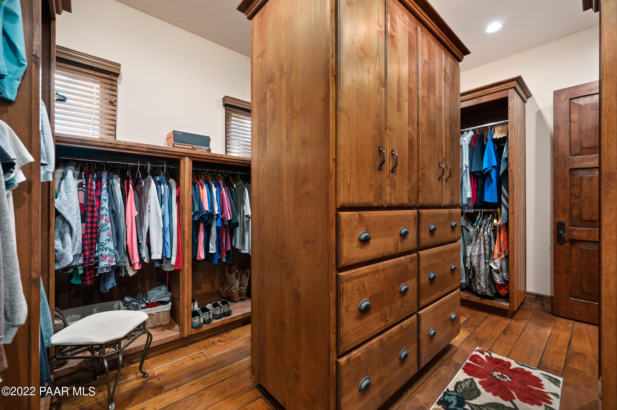 5350 West Three Forks Road Prescott, AZ 86305 - Photo 38 of 90 a view of walk in closet with clothes and shoes