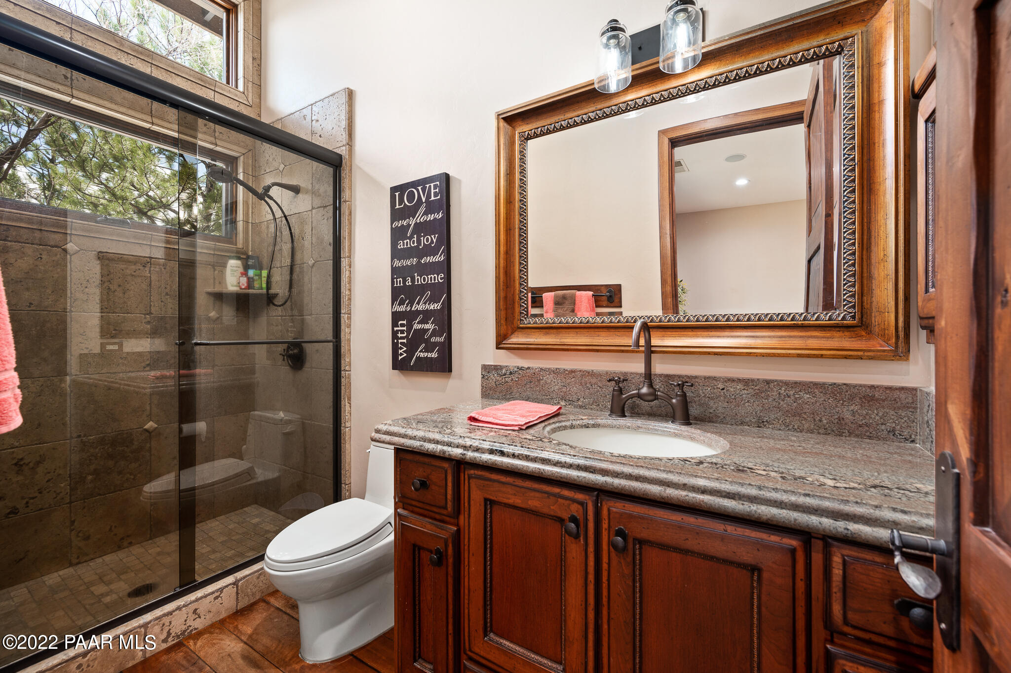 5350 West Three Forks Road Prescott, AZ 86305 - Photo 45 of 90 a bathroom with a granite countertop sink toilet and shower
