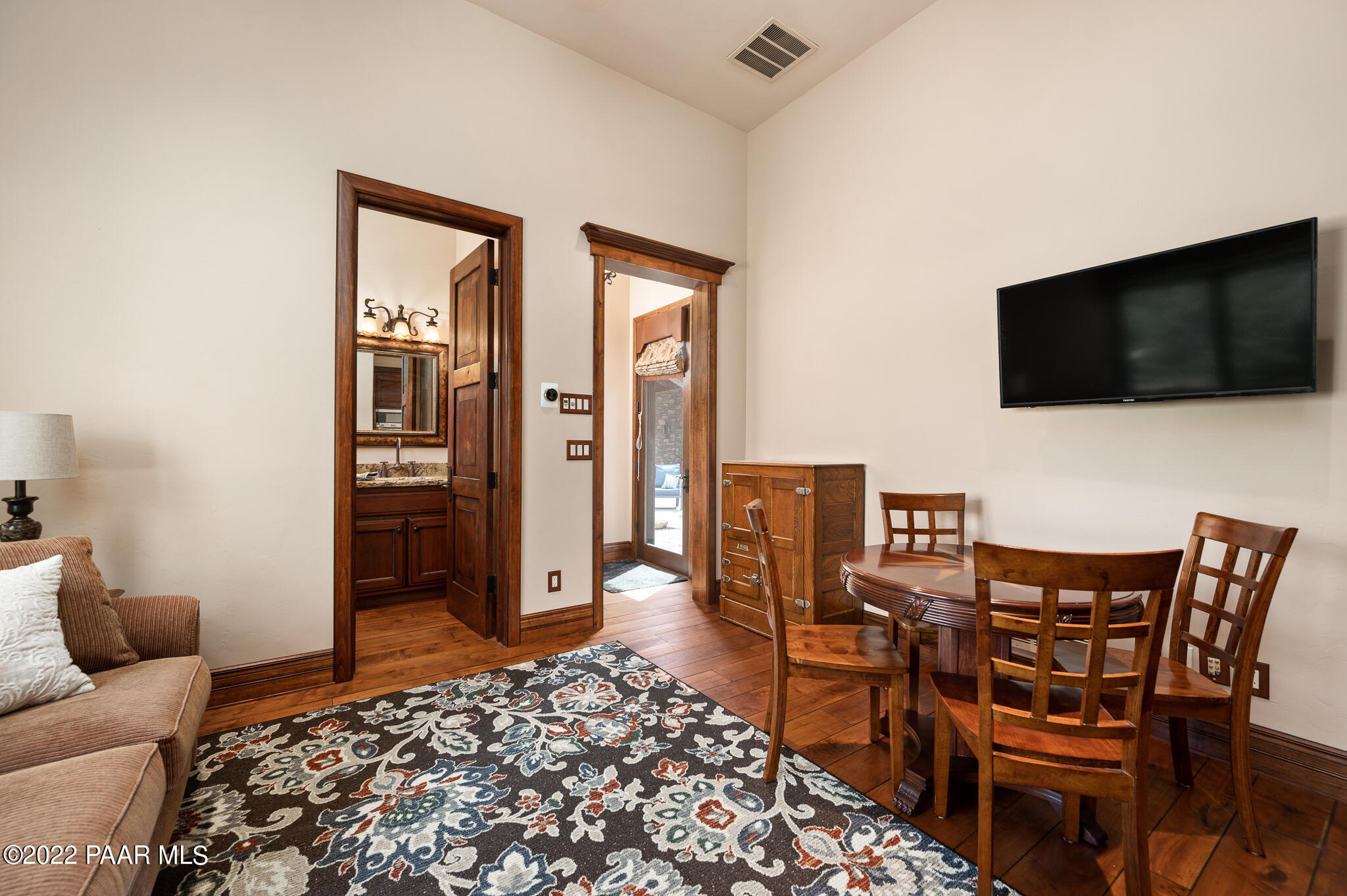 5350 West Three Forks Road Prescott, AZ 86305 - Photo 49 of 90 a living room with furniture and a flat screen tv