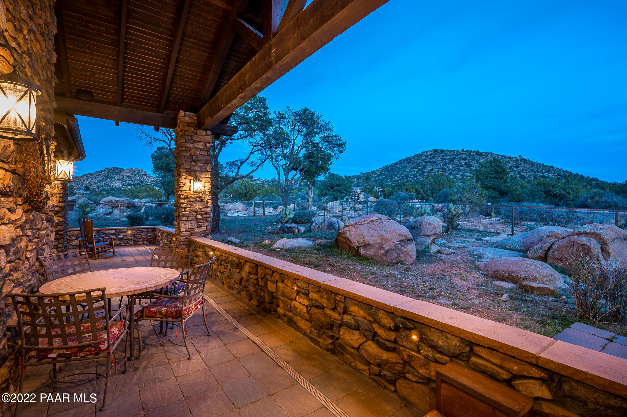 5350 West Three Forks Road Prescott, AZ 86305 - Photo 65 of 90 a view of a chairs and table in the patio