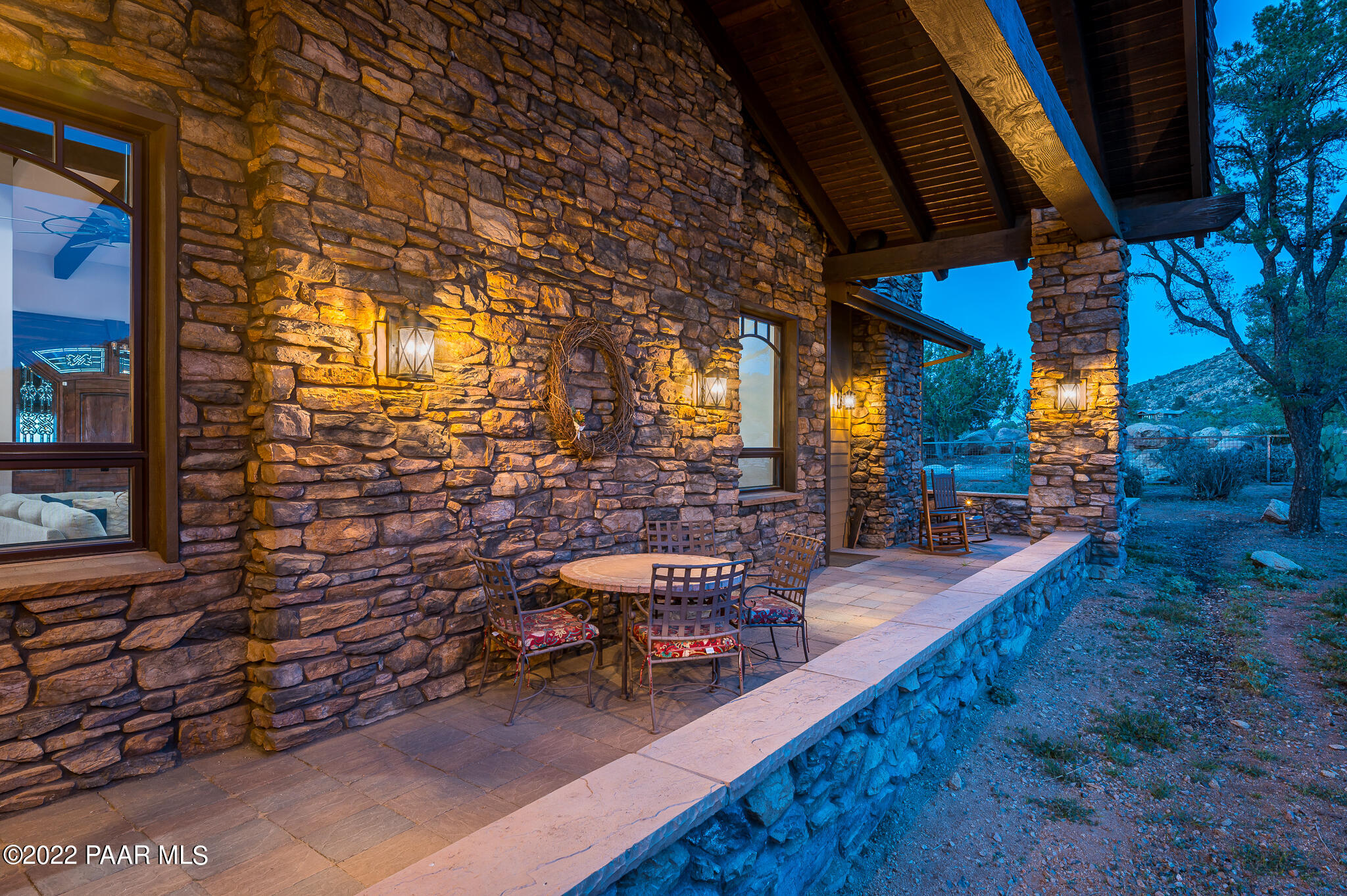5350 West Three Forks Road Prescott, AZ 86305 - Photo 66 of 90 a view of a patio with chairs and potted plants
