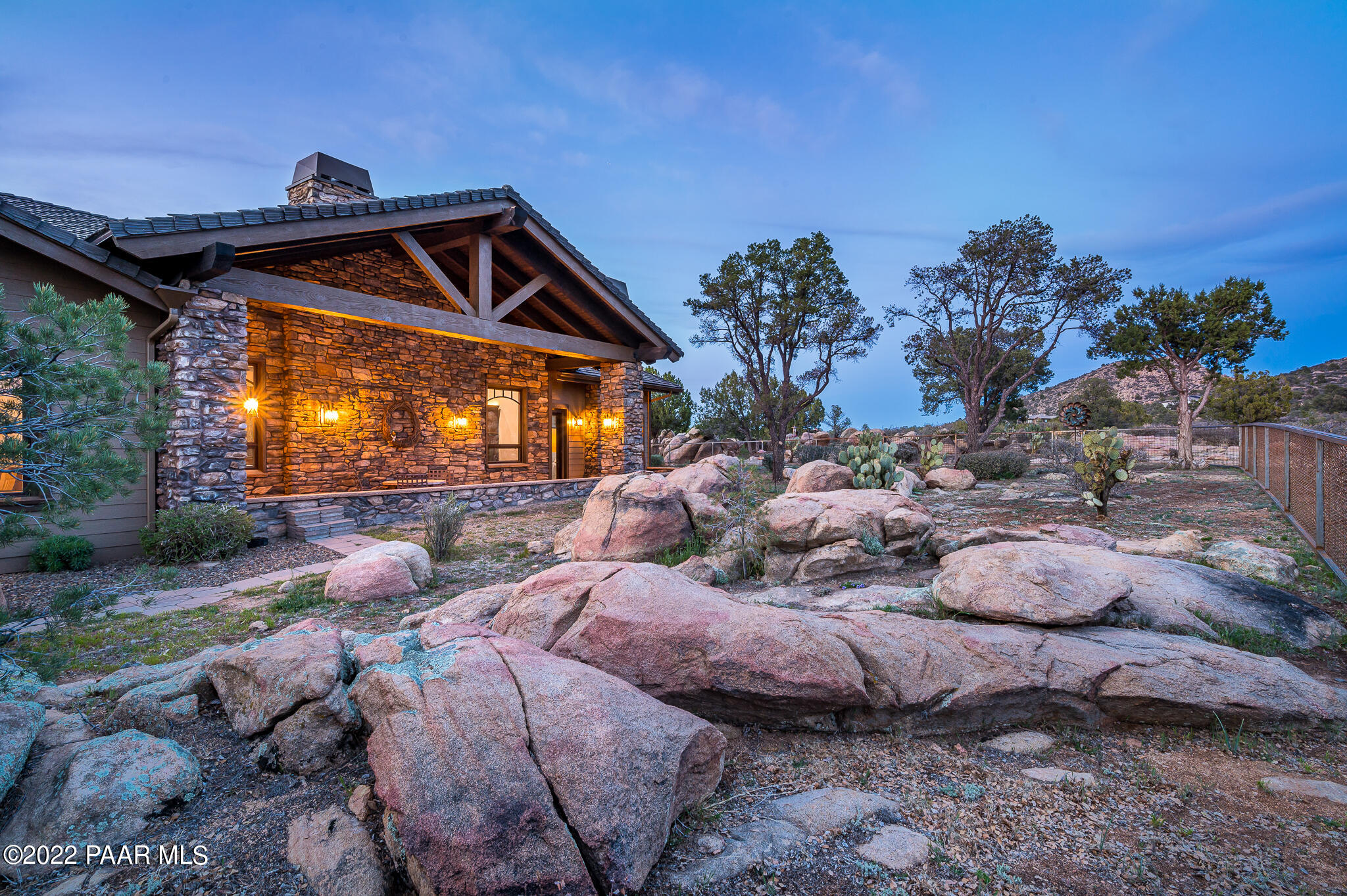 5350 West Three Forks Road Prescott, AZ 86305 - Photo 70 of 90 a view of a backyard with sitting area