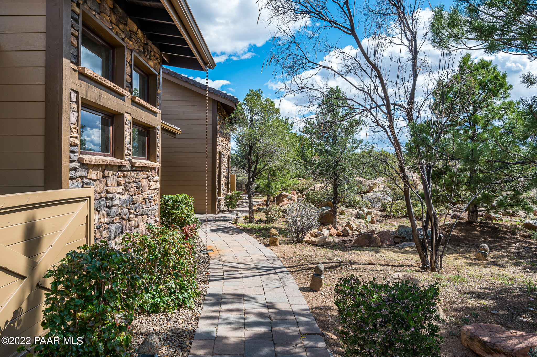5350 West Three Forks Road Prescott, AZ 86305 - Photo 74 of 90 a view of a house with backyard and sitting area