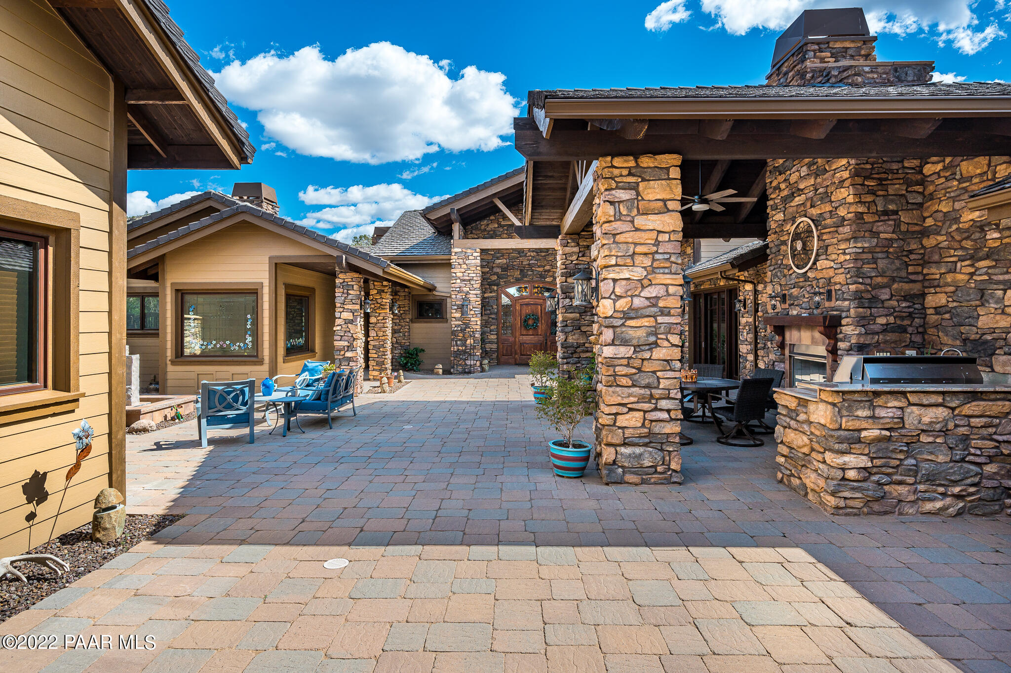 5350 West Three Forks Road Prescott, AZ 86305 - Photo 77 of 90 a view of a chairs and table in the patio