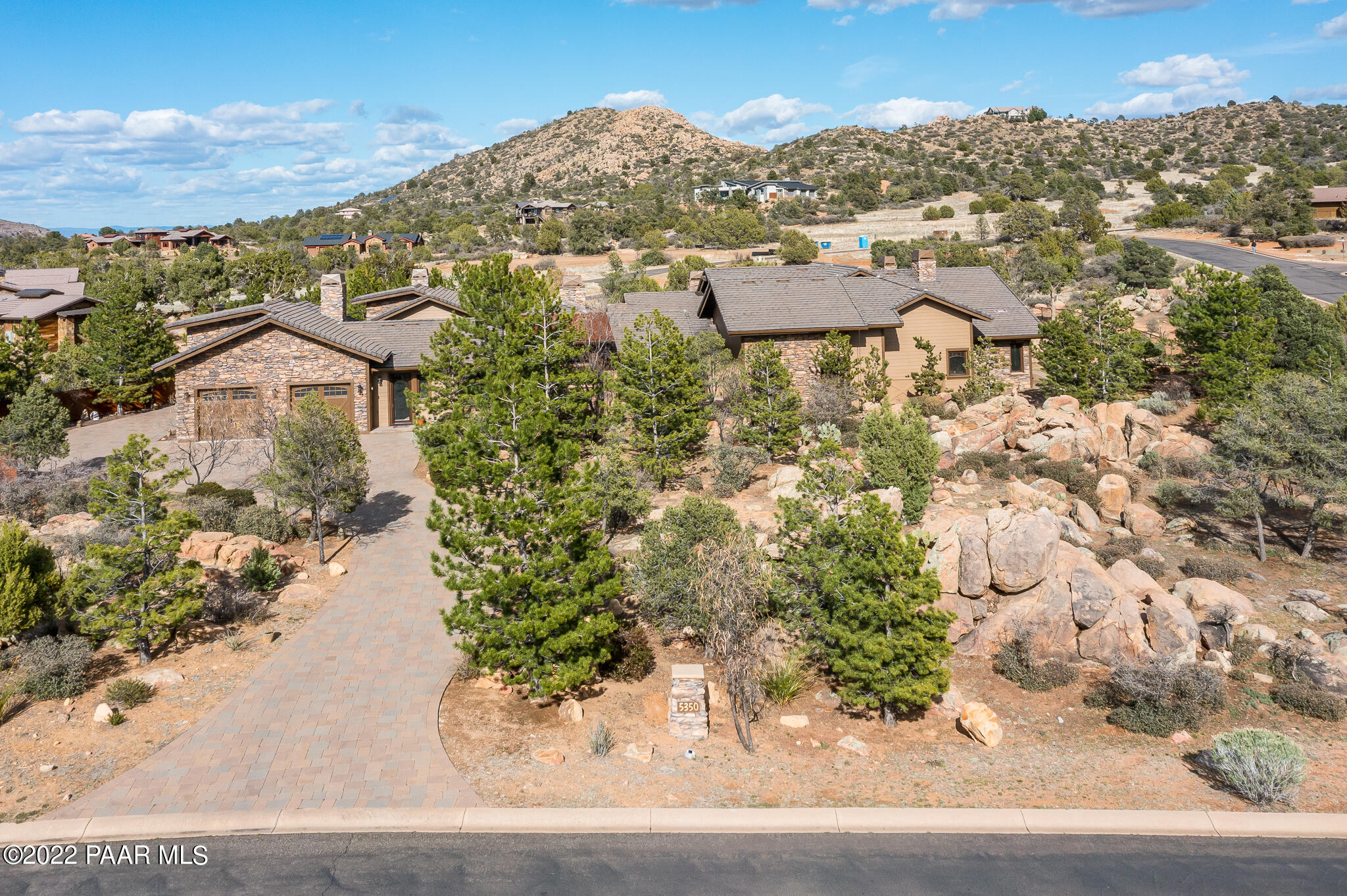 5350 West Three Forks Road Prescott, AZ 86305 - Photo 85 of 90 an aerial view of residential houses with outdoor space and trees