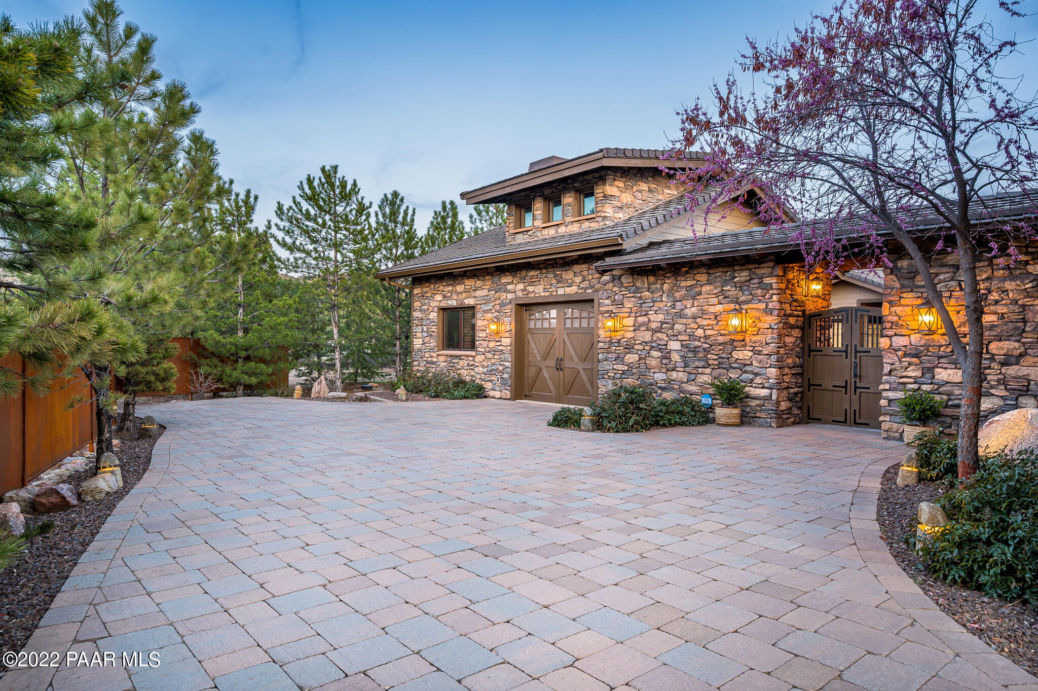5350 West Three Forks Road Prescott, AZ 86305 - Photo 10 of 90 a front view of a house with a yard and a tree