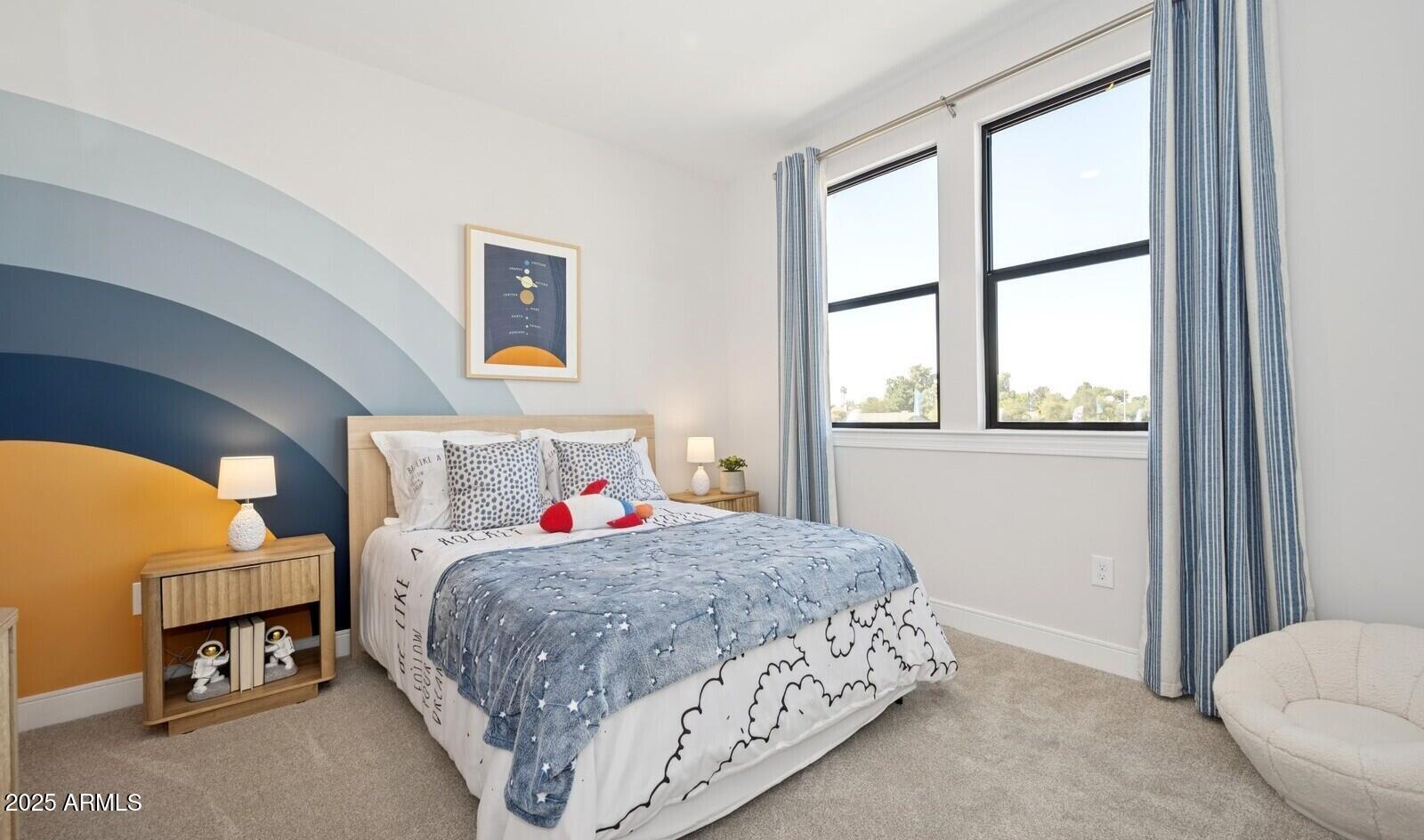 8046 West Royal Palm Road Peoria, AZ 85345 - Photo 25 of 31 a bedroom with a bed and a window