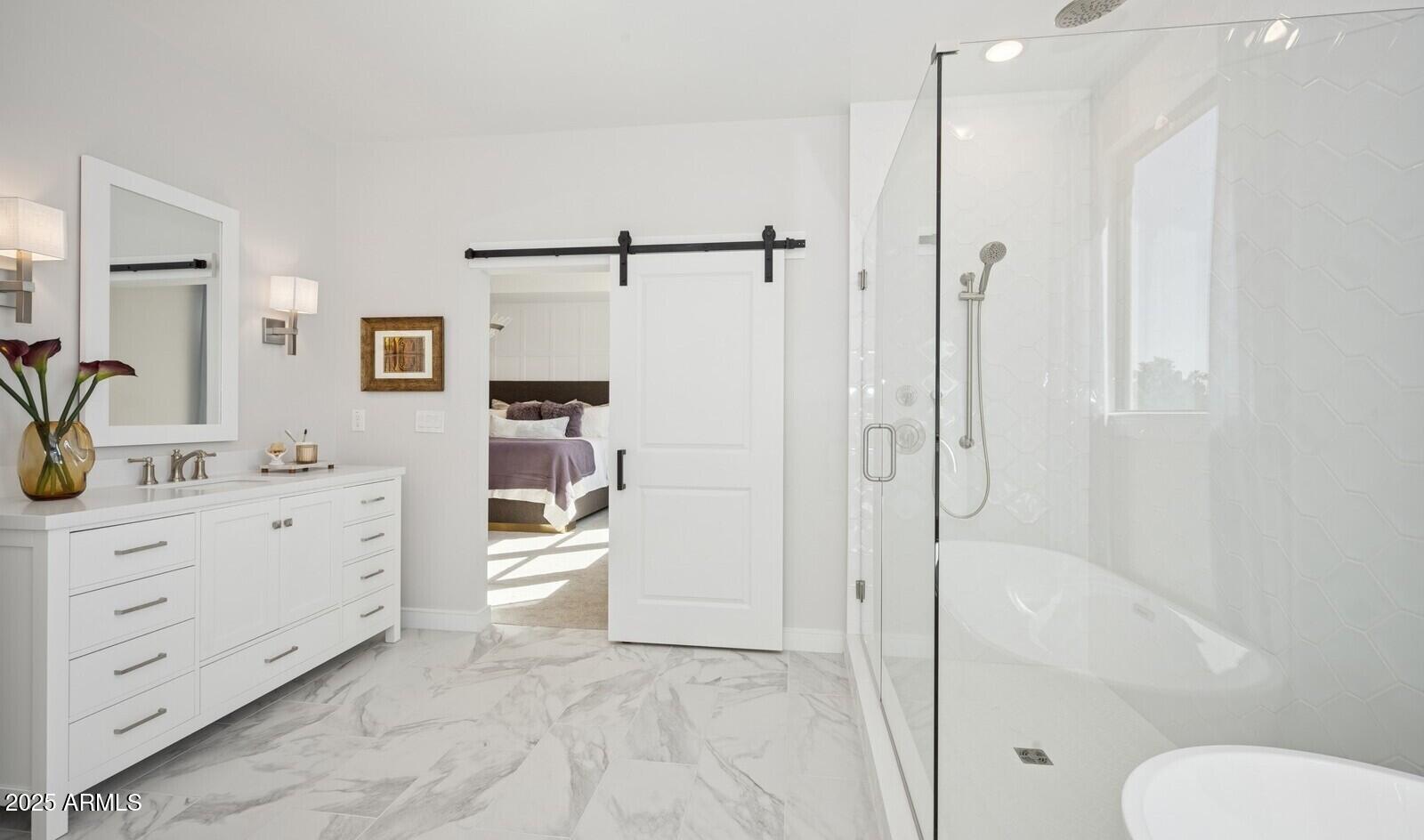 8046 West Royal Palm Road Peoria, AZ 85345 - Photo 30 of 31 a bathroom with a granite countertop sink toilet and shower