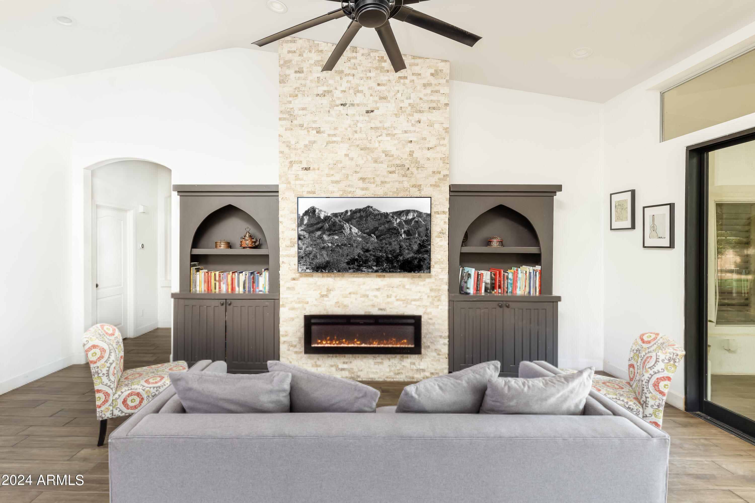 2134 East Victor Road Gilbert, AZ 85296 - Photo 5 of 15 Sit and relax in front of the fireplace