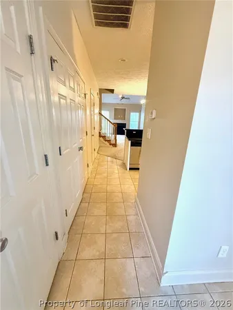 a bathroom with a sink toilet and a mirror