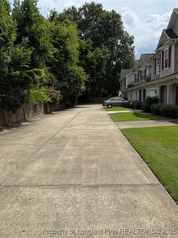 a view of outdoor space yard and swimming pool