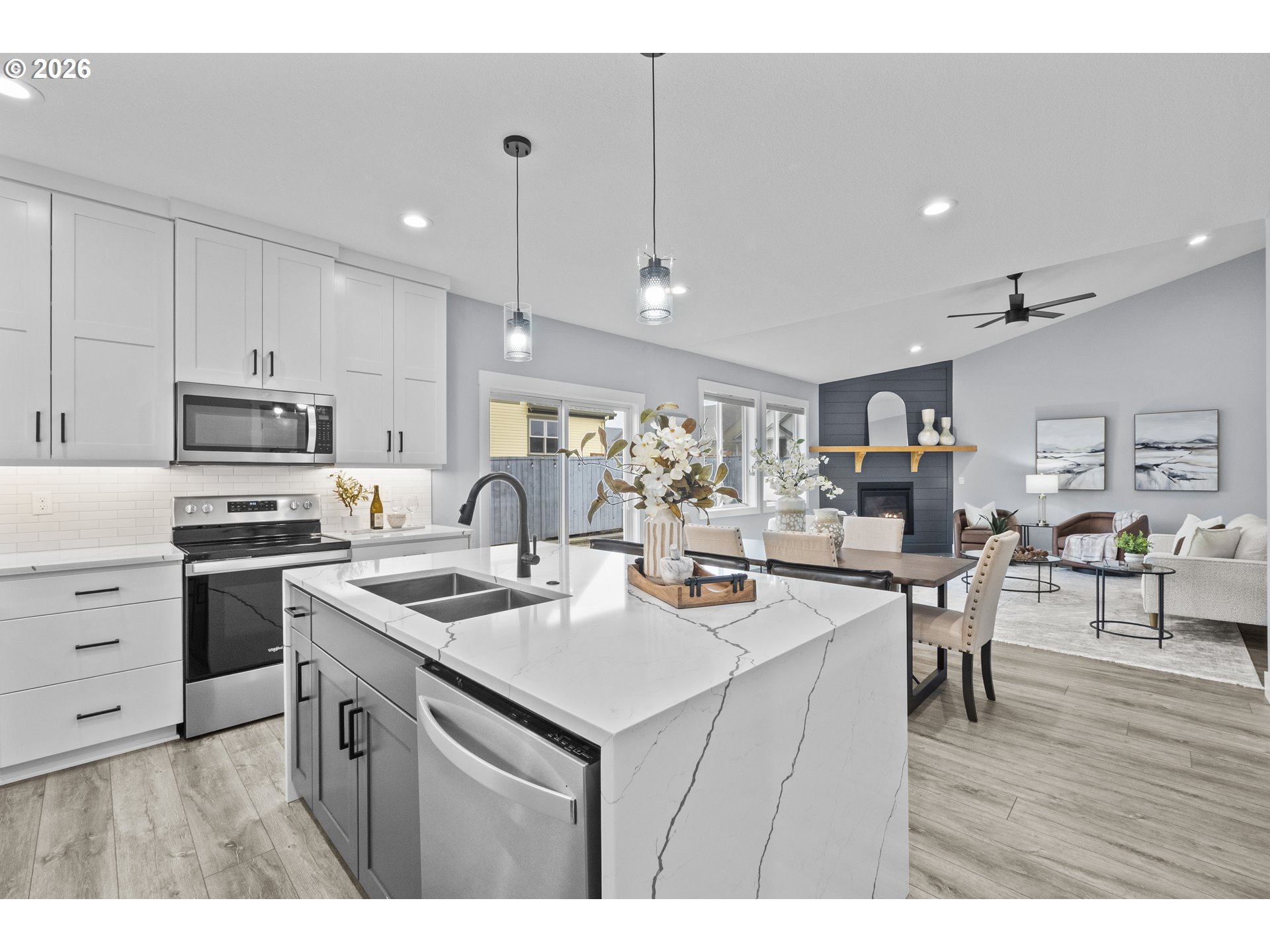 819 Riley Drive Northeast Silverton, OR 97381 - Photo 13 of 38 a kitchen with kitchen island appliances and wooden cabinets